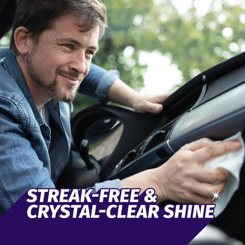Man using Auto Wipes For Cars And Screens Quick Streak Free Shine Ammonia Free Cleaner Wipes on car dashboard