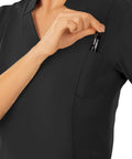 Women Slim Fit V Neck Mock Collar Scrub Top Soft Stretch Medical Uniform Nurse Shirt Super Comfy Hospital Workwear showing pocket with pen.