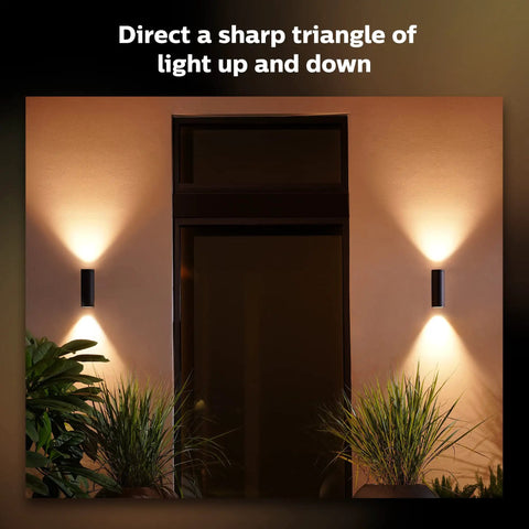 Appear Outdoor Smart Wall Light With White And Color Ambiance LED Weatherproof Porch Patio lighting illuminating wall.