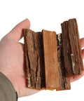 Straight Up Essential 4 Inch Craft Sticks, 45 Pcs Natural Wood Twigs With Original Bark For Rustic Diy Photo Props, School Art Projects And Handmade Card Making, Hella Versatile Bulk Supplies held in a hand showing textures.
