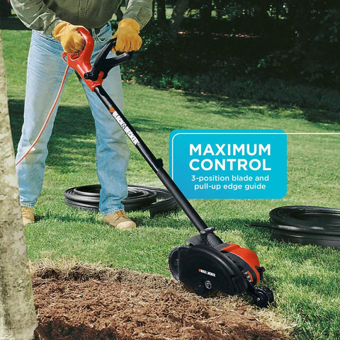 Person using 2 In 1 Electric Lawn Edger And Trencher With 12 Amp Corded Power, 7.5 Inch Cutting Width, outdoors on grass lawn.