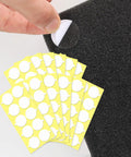 Pro Grade Dang Tough Grip Double Sided Acoustic Foam Tape 240 Heavy Duty Round Dots for wall soundproofing, showing round dots on foam.