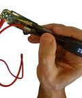 Hand holding a Shielded Two Wire Probe Connector For LCR Reader And Smart Tweezers ESR Meters with PCB component