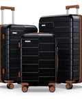 3 piece polycarbonate luggage set with durable black hard shell and brown accents, featuring spinner wheels and TSA-approved locks.