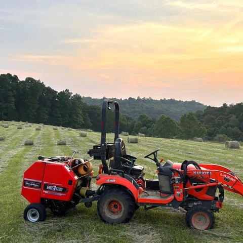All In One Hay Baler Wrapper And Rake Tedder Combo HB3120 HW20 HT100 For Farm Use with tractor in field at sunset