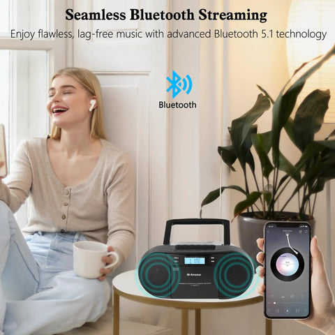 Retro Boombox CD Player And Cassette Player Combo With Bluetooth USB TF Card FM Radio on table, woman using phone