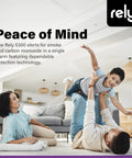 Family enjoying living room with Rely 5300 Two In One Smoke And Carbon Monoxide Detector Battery Operated With Siren Voice Alerts