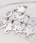 Variety of stainless steel tablecloth weights with clips, star shaped pendant 4 pack, 2.83 x 2.48 inches, silver finish