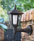 Four Pack Solar Flame Wall Lanterns Outdoor Lights Solar Powered No Wiring Needed Sconce LED Flickering Flame on brick wall