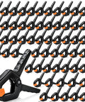 60 Pack 3.5 Inch Heavy Duty Plastic Spring Clamps For Backdrops Balloon Arches Tarp Pool Covers Woodworking Photography Crafts And DIY Projects Versatile Clip Set For Home Studio And Workshop black plastic clamps with orange jaws