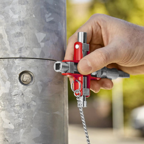 Universal Construction Control Cabinet Key with Plug In Magnetic Support for Profile Cylinder Locks tool in use on metal cabinet