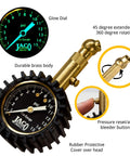 JACO Elite low-pressure tire gauge with brass body and glow dial, 15 psi, rubber protective cover.