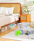 Sleek Stackable Clear Hat Organizer Two Pack With Smooth Glide Drawers Holds A Dozen Baseball Caps Each on a bedroom floor.