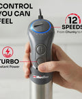 Person adjusting control knob on Boss 5 In 1 Immersion Hand Blender Set With 800W Copper Motor And Titanium Reinforced Blades 12 Speed Turbo
