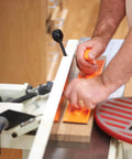 Using Must Have Power Tool Safety Set For Woodworking With Foam Grip Push Blocks on table saw for precise control and safety.