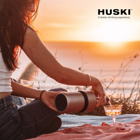 Woman using Next Gen Iceless Wine Chiller Keeps Your Bottle Cold Up To 6 Hours No Ice Needed Fits Champagne Bottles All Stainless Steel