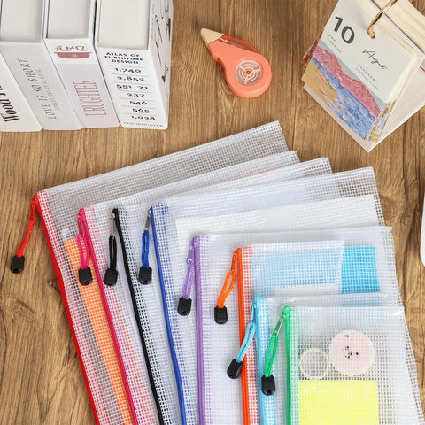 Mesh Zipper Pouch Bags Set, 30 Pieces In 8 Sizes And 8 Colors Waterproof Storage Pouches displayed on wooden surface