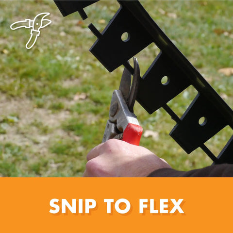 Hand using shears to cut Snip To Flex Paver Edging Kit For DIY Landscaping, 60 Feet Of Pro Grade Plastic Edging, 10 Six Foot Segments.