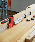 K Body REVO Extender for Dual Clamp Sets Connects Two KRE KR K KREV or KRV Clamps on wooden workbench