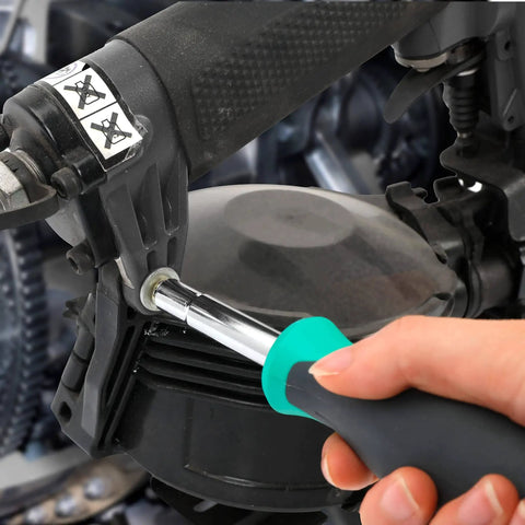 Using 6 In 1 Multi Bit Screwdriver And Nut Driver Tool With Cushioned Grip For DIY Home Projects on engine component