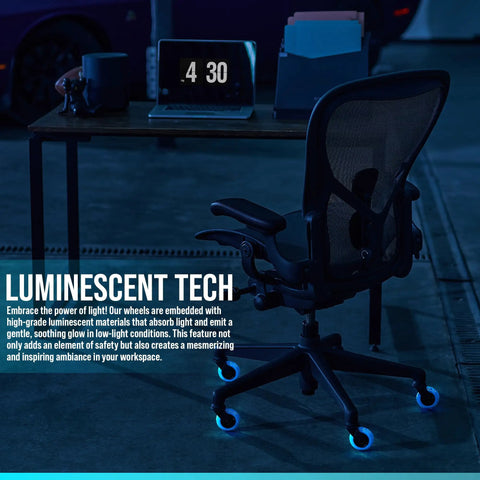 Heavy Duty Office Chair Wheels Set Of 5 Rollerblade Casters 3 Inch thick glowing wheels under a black office chair in a dim workspace.