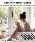 Woman with headphones near window featuring 4 Pack Self Stick Cabinet Handles Pulls No Drill Install ABS Plastic Drawer Pulls