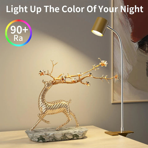 USB Clip Desk Lamp With 360 Gooseneck Reading Light For Home Office next to decorative golden deer sculpture