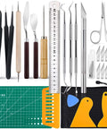 Front view of 28-piece vinyl weeding tool set with steel picks, wooden handles, ruler, A5 cutting mat, and scrapers