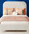 White Queen Boucle Upholstered Platform Bed With Rounded Headboard Sturdy Wood Slats Plush Cloud Back Cushioning in modern bedroom.