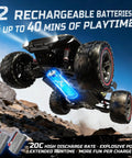 DEERC 209E 1:10 Scale Brushless RC Car mid-jump showcasing dual battery feature for extended playtime, rocky terrain background