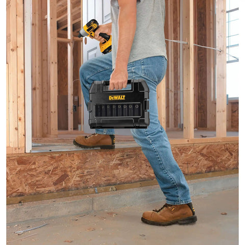 Man holding Impact Socket Set With Half Inch Drive Ten Piece Including Eight Common Sockets And Two Adapters For Quarter To Half Inch Built To Last High Impact Case With Pivoting Organization Pins for easy transport on construction site.