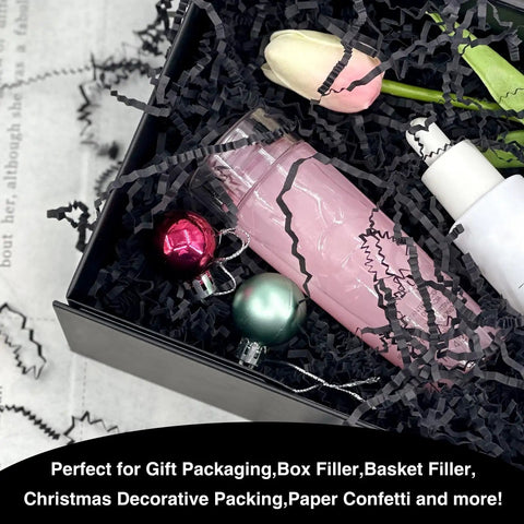 One Pound Crinkle Cut Paper Shred Filler For Gift Boxes Baskets And Bags Perfect For Holidays Parties Sub Boxes And Mailers Eco Friendly Recyclable Black Shredded Paper Packaging Filler with pink bottle and ornaments in box