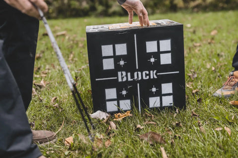 3D Archery Target 48 Inch Tall With Replaceable Insert outdoors on grass, black with block design, weather-resistant foam