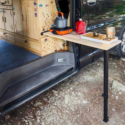 Game Changer Heavy Duty Telescoping Table Slider Leg With Slick Height Adjustments For RVS Campers Boats And Trailers Solid Aluminum Build supporting a camping table.