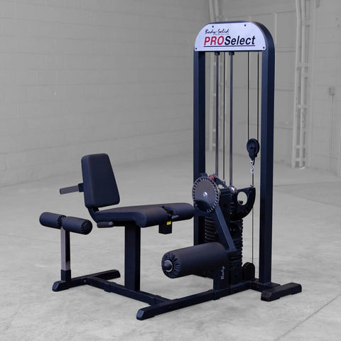 Built Tough Leg Extension And Curl Machine With A Massive 310 Lb Weight Stack Designed For Killer Leg Day Gains Serious Strength Building And Home Gym Flexes, viewed from the side in a home gym.
