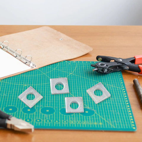 Top Shelf Carbon Steel Square Lock Washers For Leveling Shims And Bolt Assembly Hardware Featuring A Genuine Half Inch Inside Bore on a workspace.