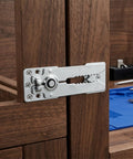 Heavy Duty Stainless Steel Sectional Couch Connectors With Rock Solid Grip And Anti Slip Design attached to wooden frame for secure fitting.