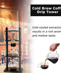 Large Capacity Cold Brew Coffee Maker Tower With 1000ml Vertical Glass Carafe And Solid Wood Stand in an elegant setting.