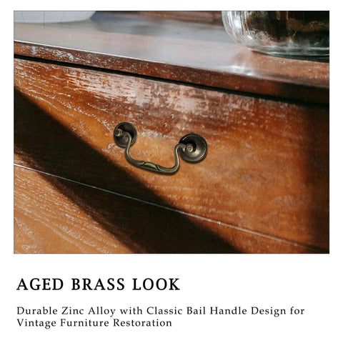 Antique Brass Cabinet Pulls Three And One Quarter Inch Center European Style Decorative Drawer Handles on wooden dresser