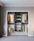 Sleek Modular Closet Organizer Wall Mounted Kit With Heavy Duty Hanging Rods Adjustable Shelves Smooth Glide Rails Grey Finish No Sweat Installation Organization System displaying stylish clothing and shoes.