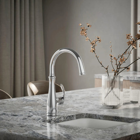 Bellera Bar Sink Faucet With High Arc Swing Spout And 360-Degree Rotation in polished chrome on marble countertop
