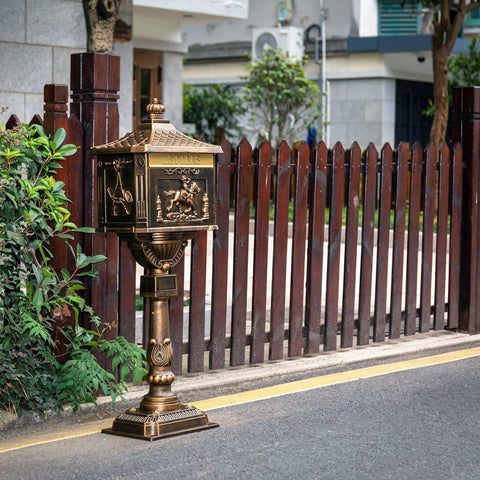 Rustproof Cast Aluminum Locking Curbside Mailbox With Post Mount Large Black Beefy Heavy Duty Security Mailbox For Letters Magazines And Small Parcels Durable Weatherproof Design Built To Deter Fishing And Keep Mail Safe installed by a fence