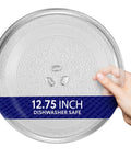 12.75 Inch Microwave Glass Plate Replacement For Sears Kenmore LG being held, showing dishwasher safe label