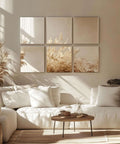 Silver mirror acrylic panels, set of six square wall art pieces on a beige living room wall.