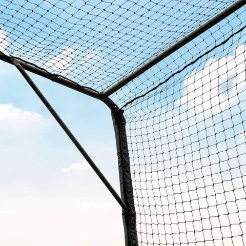Corner of Portable Mobile Baseball Batting Cage With Wheels 36ft Net With Padding Easy Setup On Any Surface against blue sky