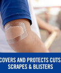 Person wearing Waterproof Clear Bandage on elbow, showing 360 Degree Seal in outdoor environment; protects in wet conditions.
