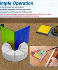 Rock Solid Glass Multi Angle Jig For Stained Glass Art Projects With 3D Soldering Station holds green and blue glass panels securely during soldering.