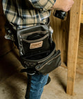 TrapJaw Oil Tan Leather Tool Pouch With Front Access in use, showing wide opening snap closure on belt, Model 1L-995-1