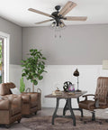 52-Inch Industrial Style LED Ceiling Fan With Light Kit, Bronze Finish, in living room setup with Edison style cage lights.