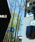 Beefy 30A Portable Surge Guard With Cover For Outdoor Use, Easy Pull Handle visible on a power pedestal in campsite setting